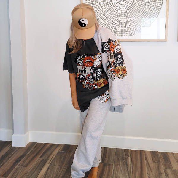 Bring bold retro energy to your wardrobe with this 3-piece vintage Western tattoo graphic set, including a cozy sweatshirt, Comfort Colors tee, and matching flame-dice sweatpants.