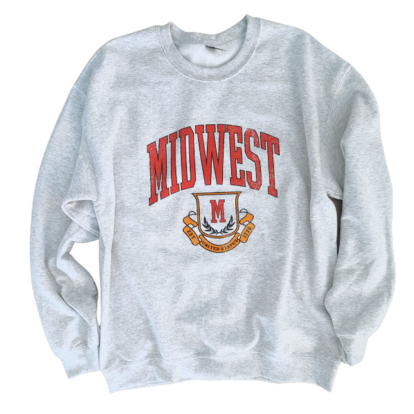 This Midwest Sweatshirt and Sweatpants Set combines cozy comfort with classic collegiate style. Featuring a distressed varsity-inspired Midwest graphic on a matching ash gray crewneck and jogger set, this outfit is perfect for travel days, casual weekends, running errands, or relaxing in ultimate comfort. Sweatpants feature a relaxed oversized fit, and for an oversized fit size up in our crewneck. Matching Midwest graphic t-shirt sold separately.