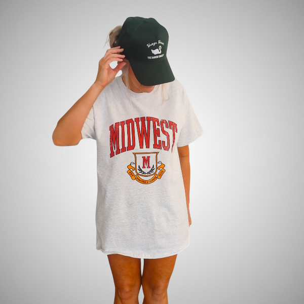 This Midwest T Shirt and Sweatpants Set is the perfect combination of comfort and effortless collegiate style. Featuring a distressed varsity-inspired Midwest graphic on a matching ash gray t-shirt and jogger set, this outfit is ideal for lounging, travel days, running errands, or creating a casual streetwear look you'll wear on repeat with sweatpants that feature a relaxed oversized fit and for a trendy overside t-shirt fit size up. Matching Midwest sweatshirt sold separately, pair all three pieces for the